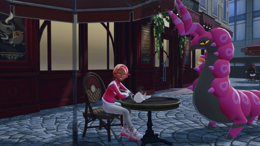 『ポケモンLEGENDS　ZA』のスクリーンショット。カフェでお茶をする主人公とペンドラー。主人公のファッションは、ピンクのトップスに白いボトムス。